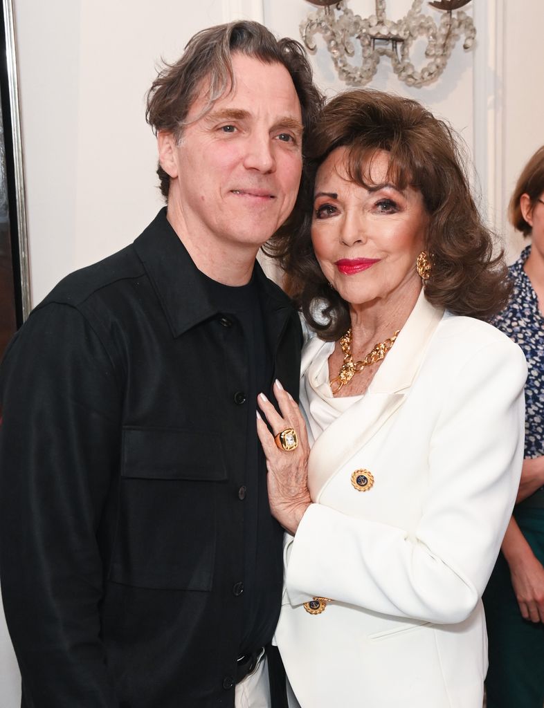 Alexander Newley (L) and Dame Joan Collins attend the launch of new book Divining The Human: The Art Of Alexander Newley