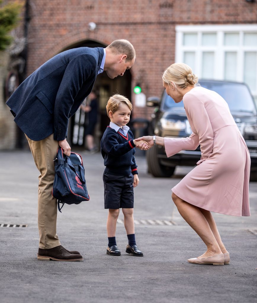 Prince George shakes headteacher's hand on first day at school