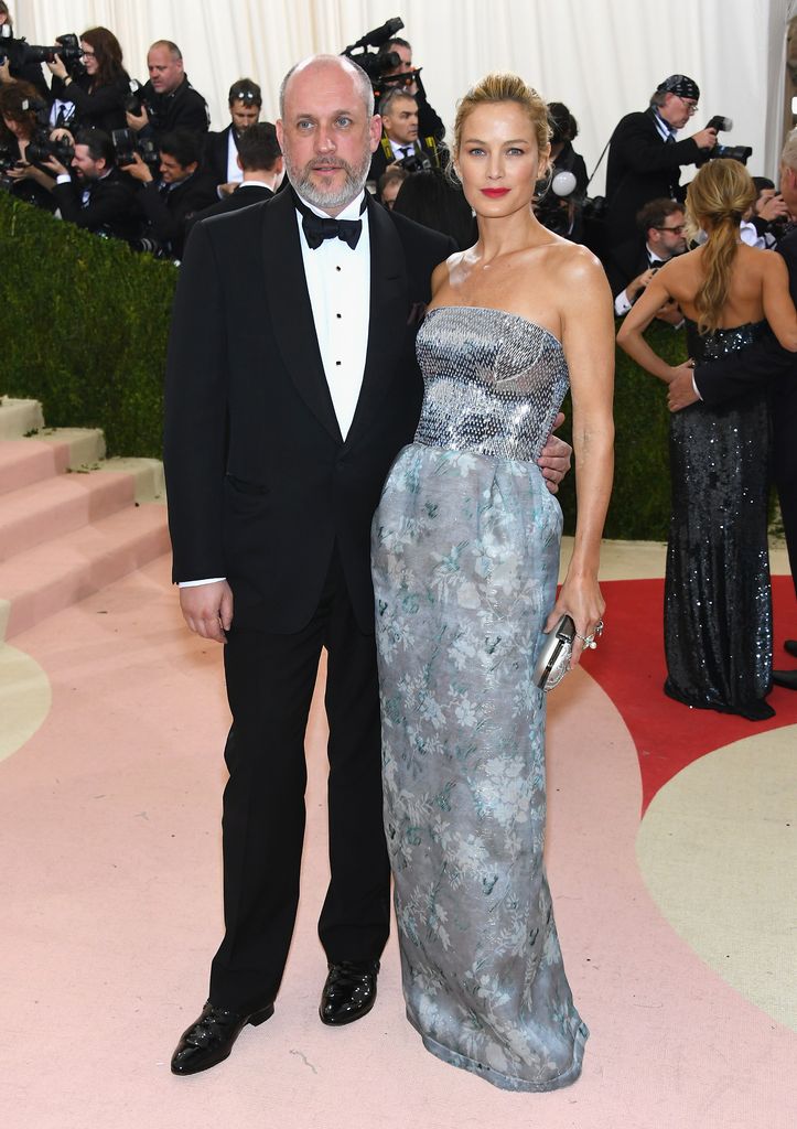 Peter Copping and Carolyn Murphy attend the Met Gala in black tie and Carolyn wearing a silver strapless gown 