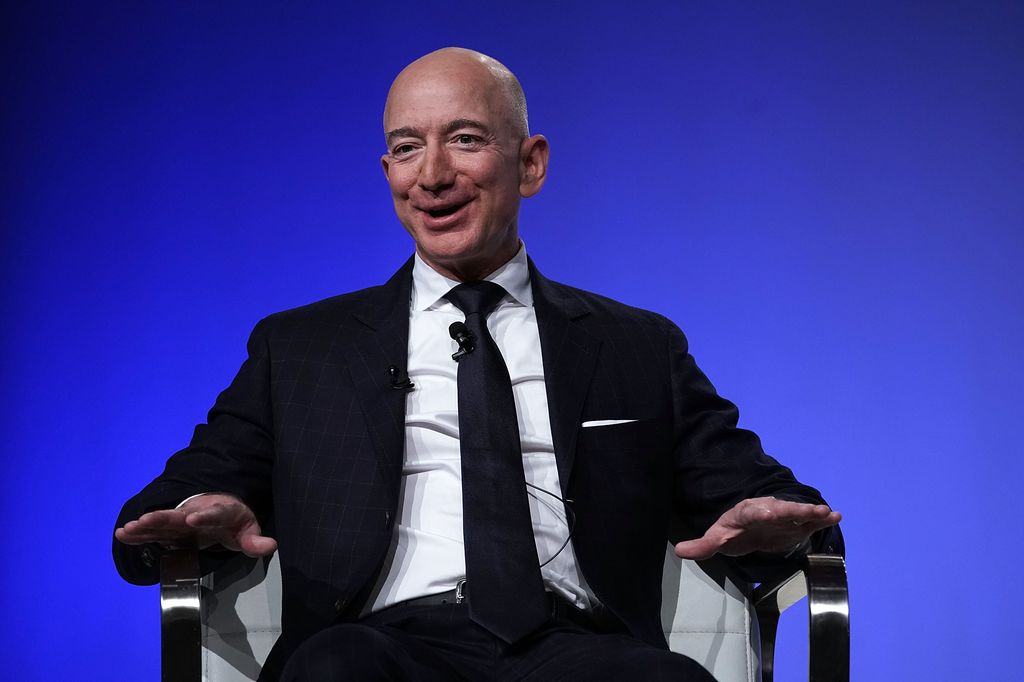 Jeff Bezos sits in chair at Air Force Association in September 2019