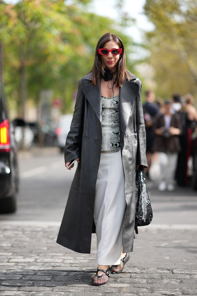 A guest wearing mesh flats at the Paris Fashion Week SS24 shows