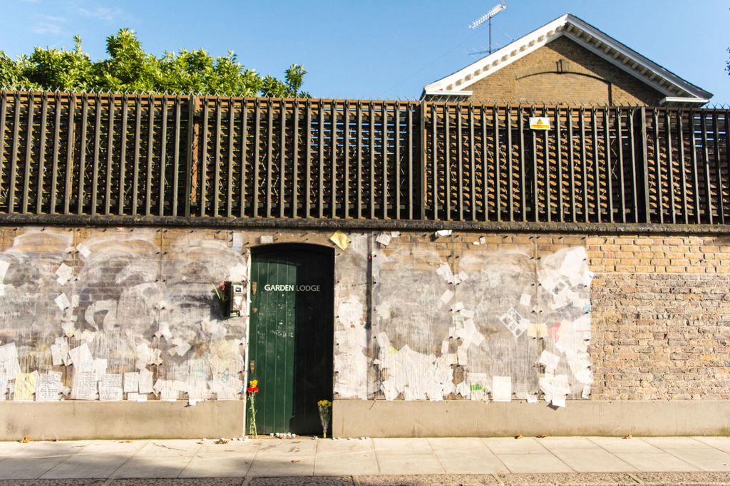 The Garden Lodge, Freddie Mercury's last home, with its walls covered in graffiti and messages from fans from all around the world
