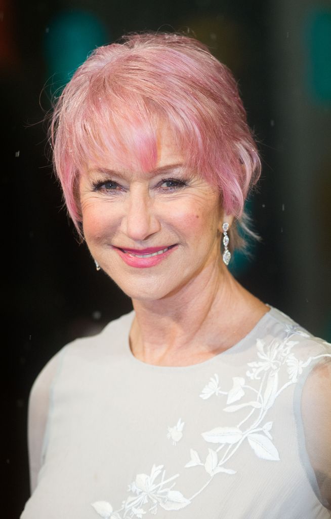 Helen Mirren with short pink hair