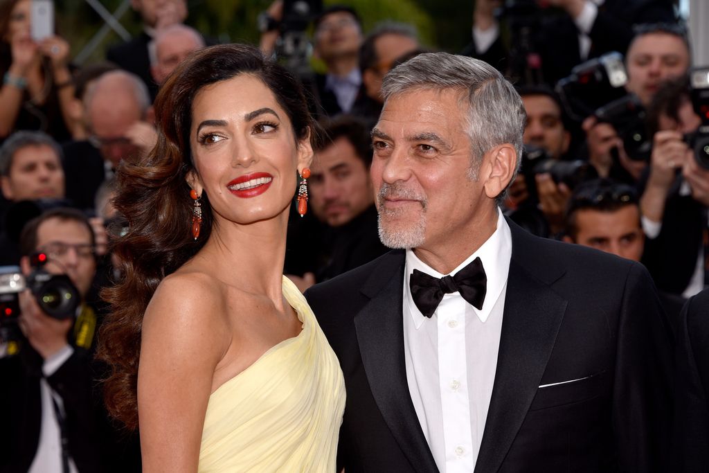 George Clooney and his wife Amal Clooney visit the "Money monster" Premiere during the 69th Annual Cannes Film Festival at Palais des Festivals on May 12, 2016 in Cannes, France.