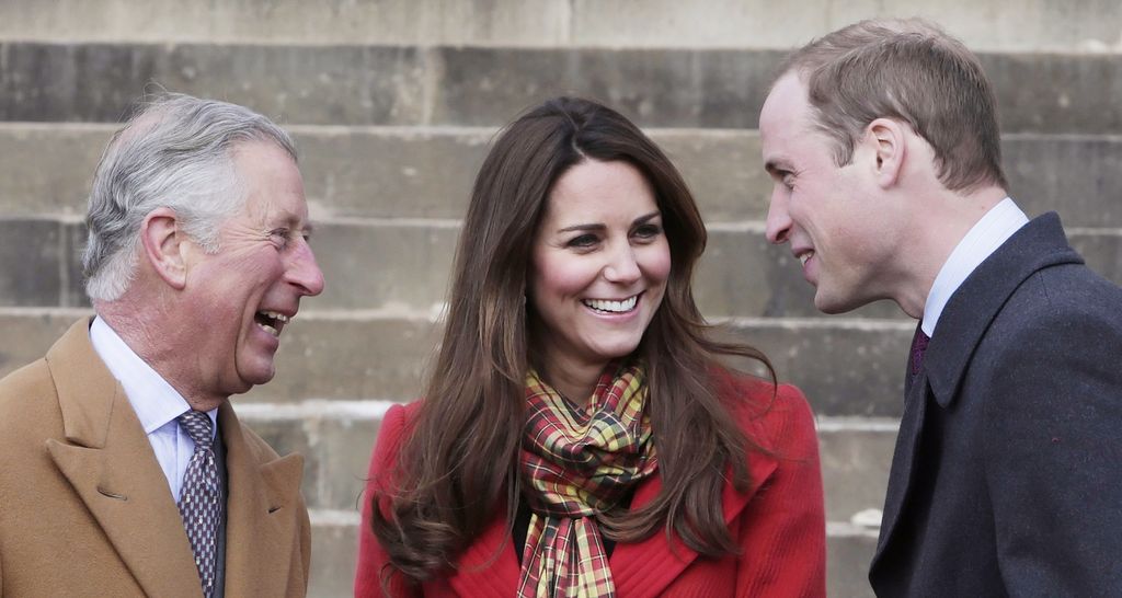 King Charles laughing with Prince William and Princess Kate