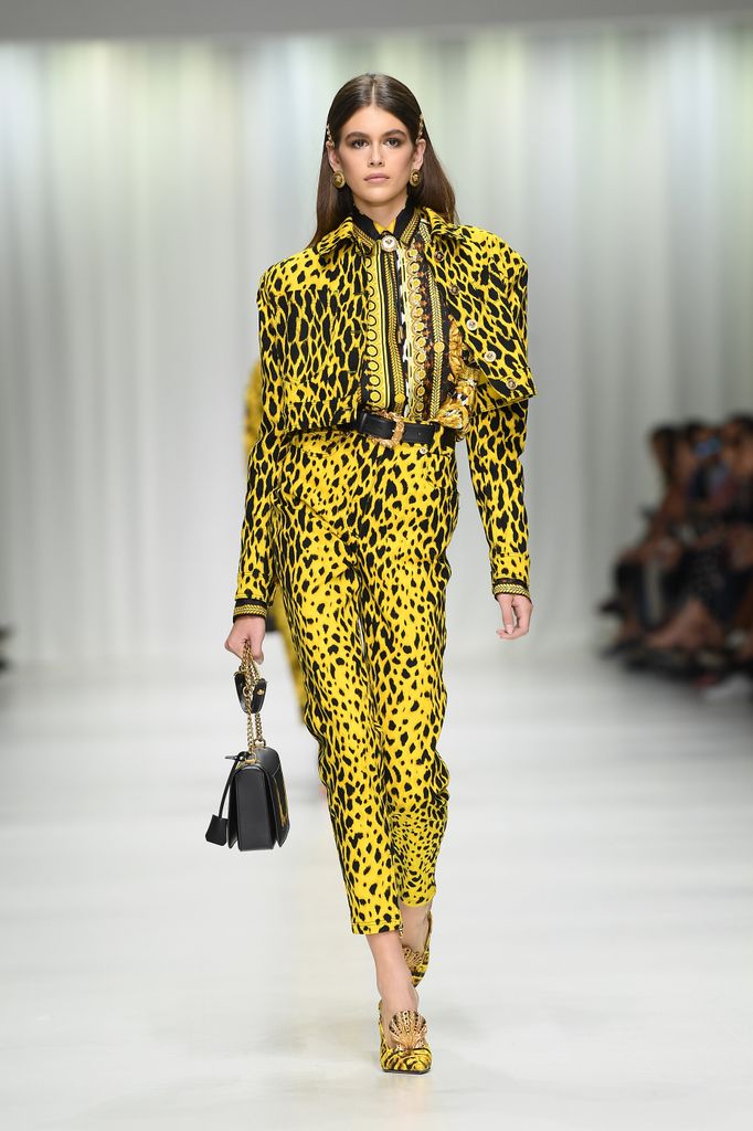 kaia gerber in bright yellow animal print runway look