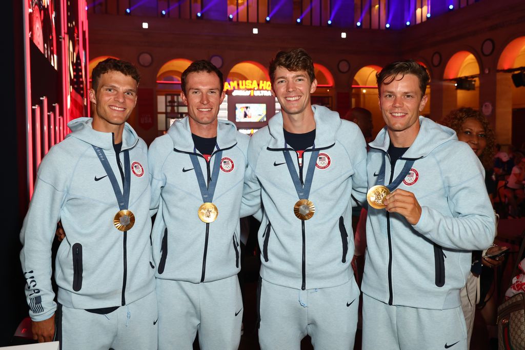 U.S. Olympians Nicholas Mead, Justin Best, Michael Grady and Liam Corrigan pose for a photo at the USA House at Paris 2024 on August 02, 2024 in Paris, France