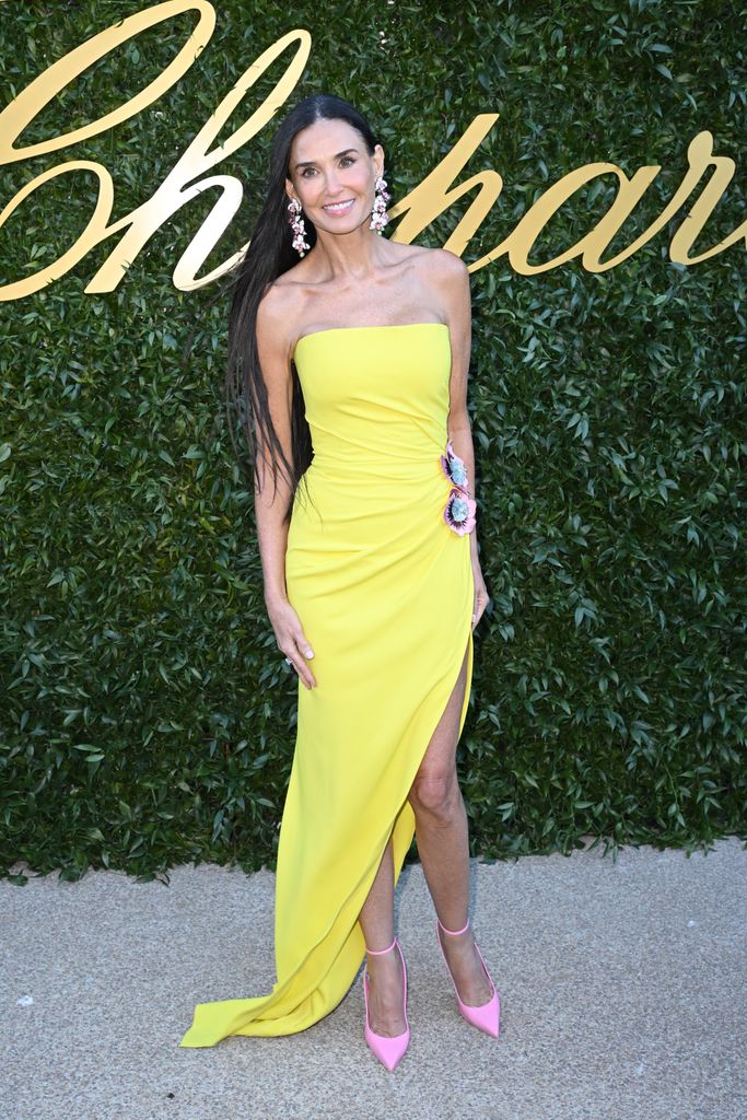 Demi Moore in yellow gown