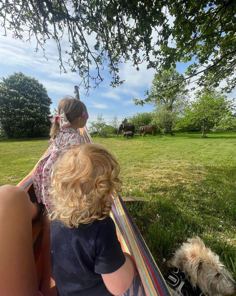 Wilfred Johnson and Romy Johnson on a hammock on Carrie Johnson's Instagram