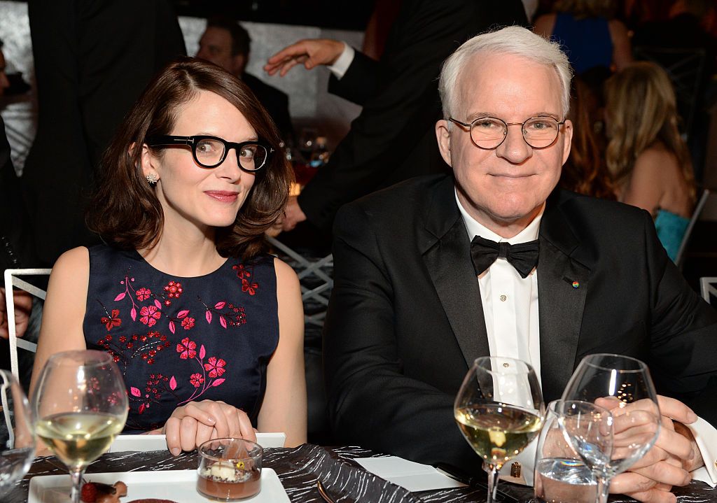Steve Martin and wife Anne sitting together at a Lifetime Achievement dinner in honor of Steve