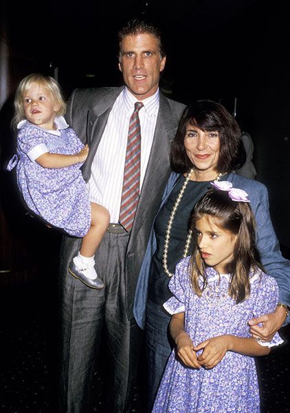 ted danson and casey coates smiling for a photo with their two daughters