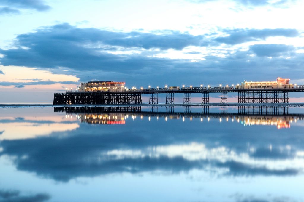 view of worthing pier at dusk