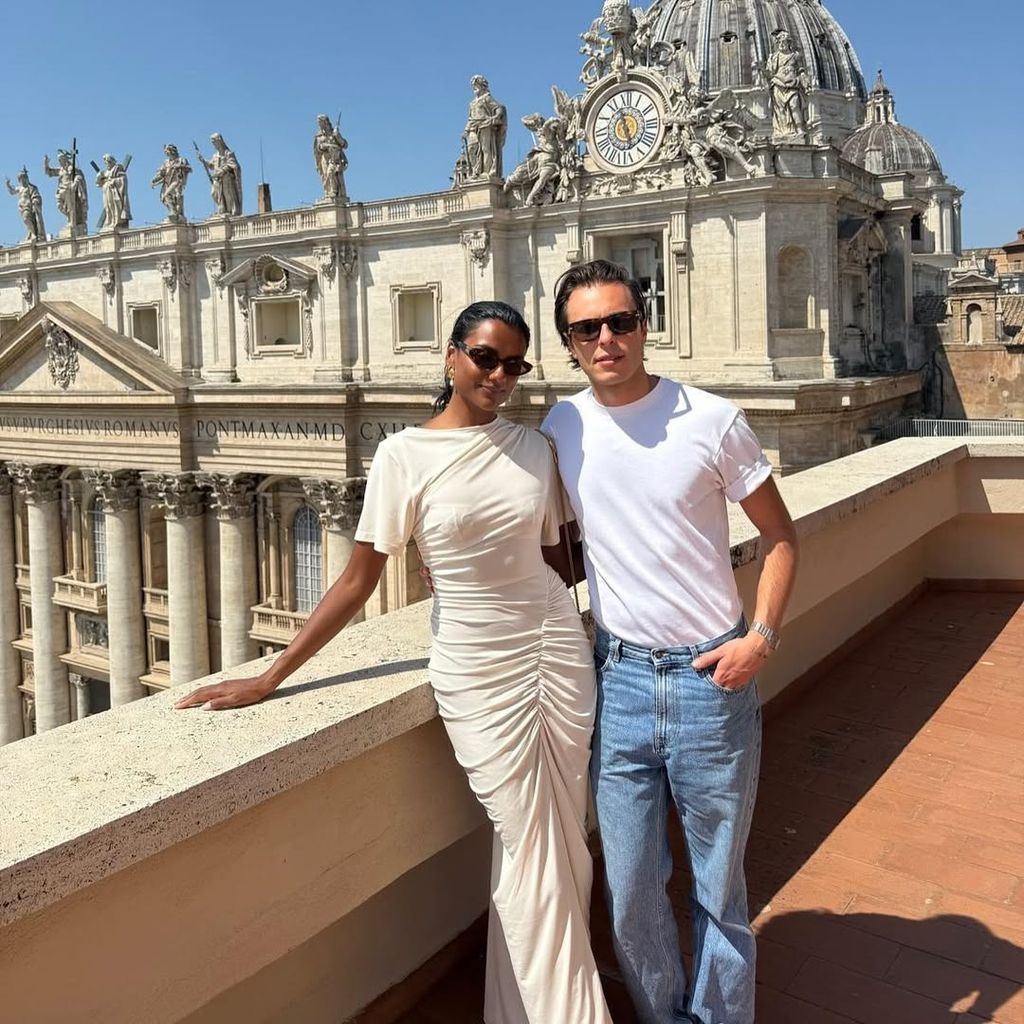 Simone ashley and 16Arlington creative director Marco Capaldo in white outfits in rome