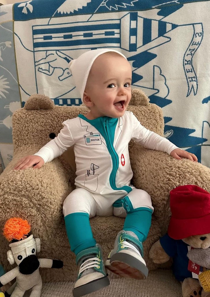 Photo shared by Paris Hilton on Instagram January 16 in a 1st birthday tribute to her son Phoenix, where he is sitting in a teddy bear chair wearing a doctor costume