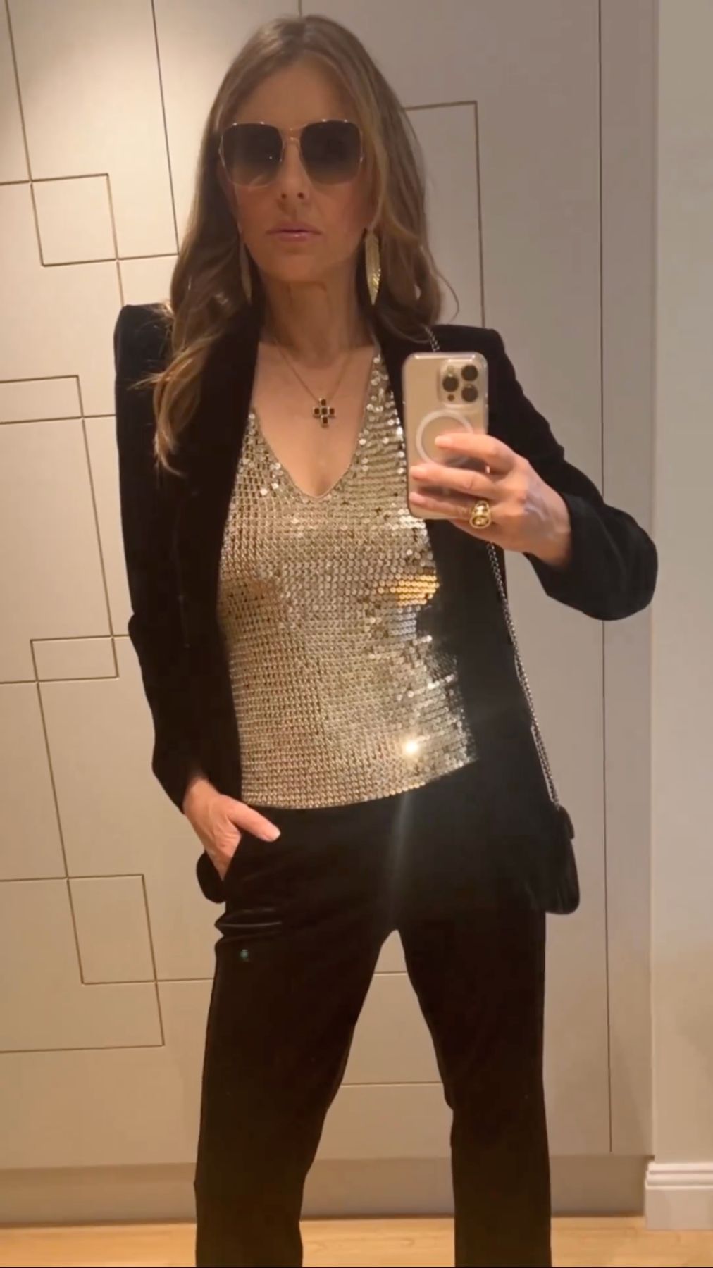 Elizabeth Hurley Dons Sequined Plunging Top And Skinny Jeans For