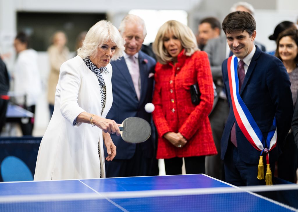 Camilla plays table tennis