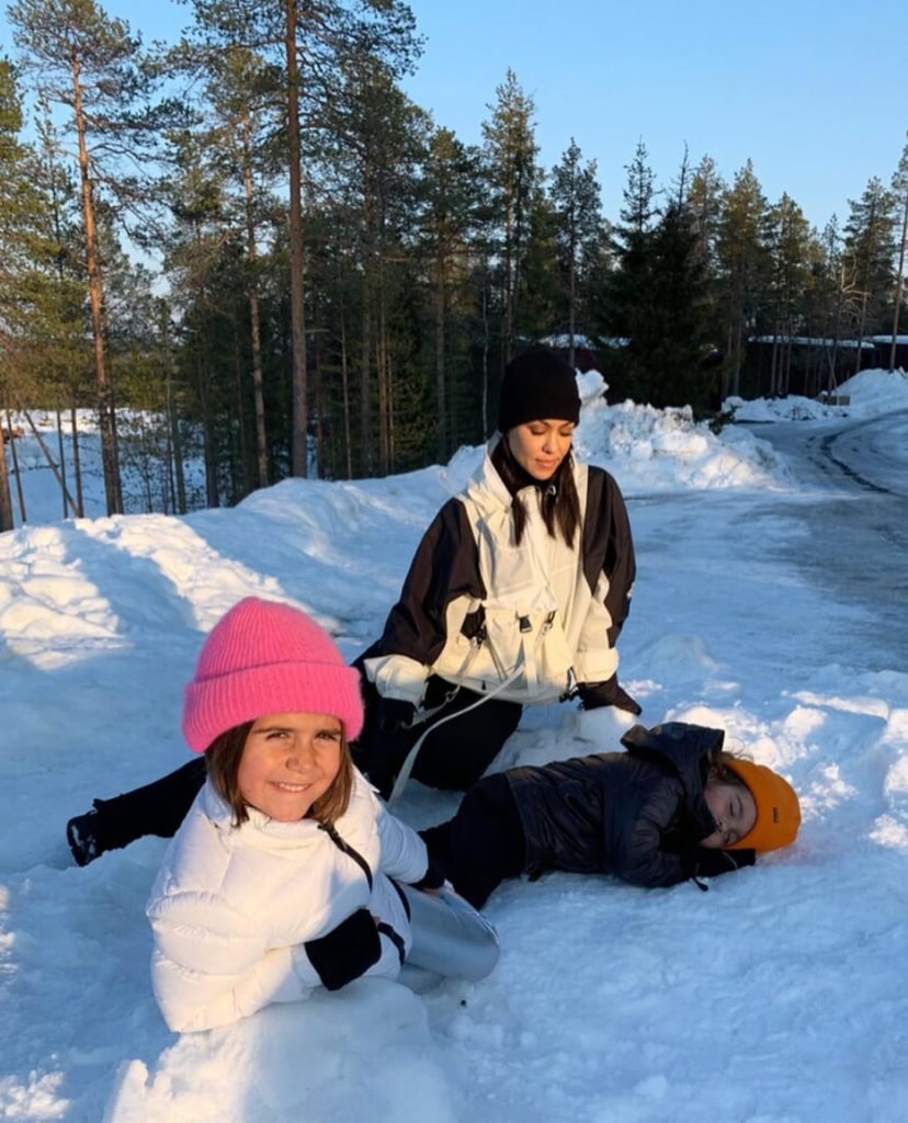 Kourtney Kardashian in the snow with her children