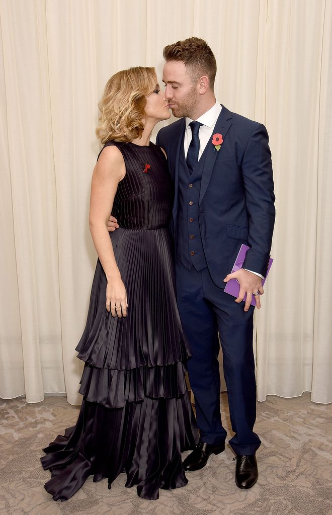 Helen Skelton and Richie Myler sharing a kiss