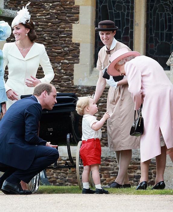 a photo of kate william queen elizabeth and a uniformed norland nanny gathered outside of a church ahead of a christening as they gather around prince george as a toddler