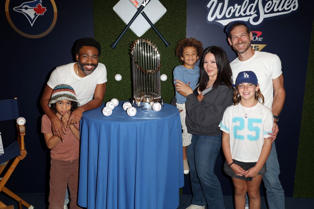 Donald Glover poses for a photo with his family prior to Game Four of the 2025 World Series presented by Capital One between the Toronto Blue Jays and the Los Angeles Dodgers at Dodger Stadium on Tuesday, October 28, 2025 in Los Angeles, California.