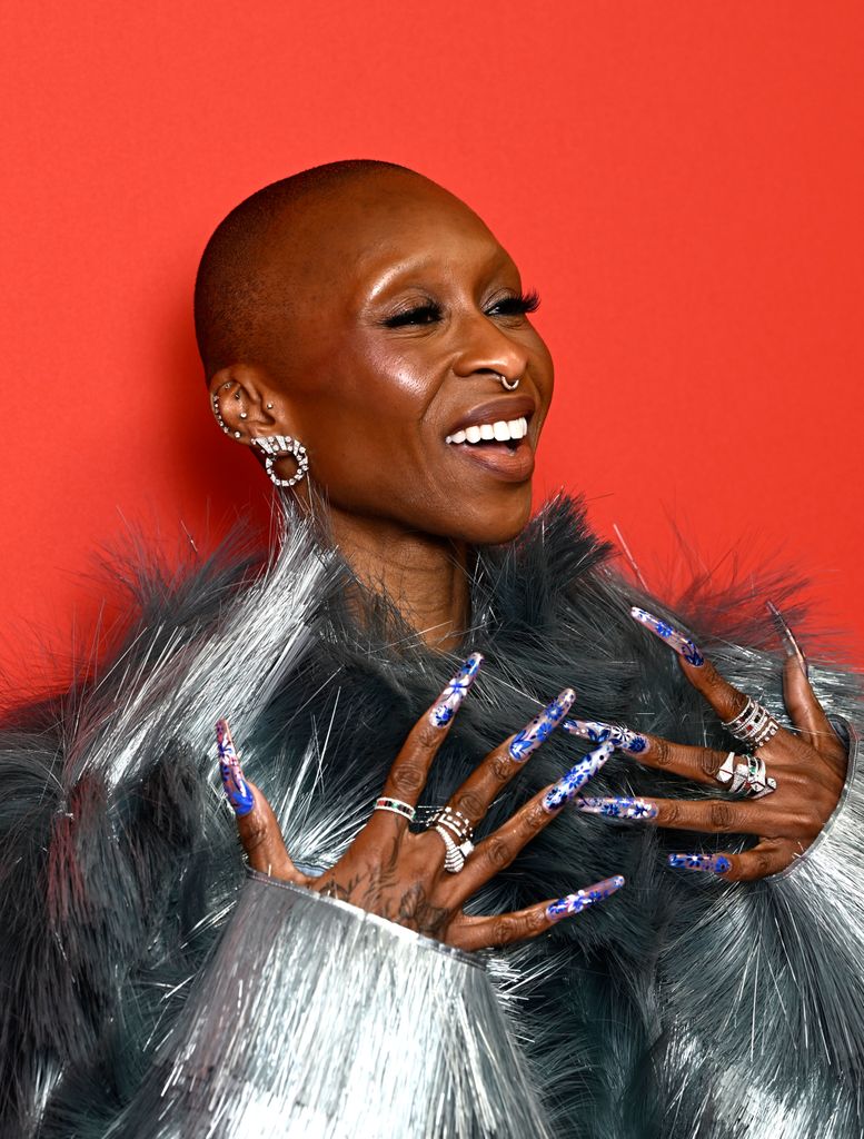 Cynthia showcases her stunning nail art at the GQ Men Of The Year Awards 