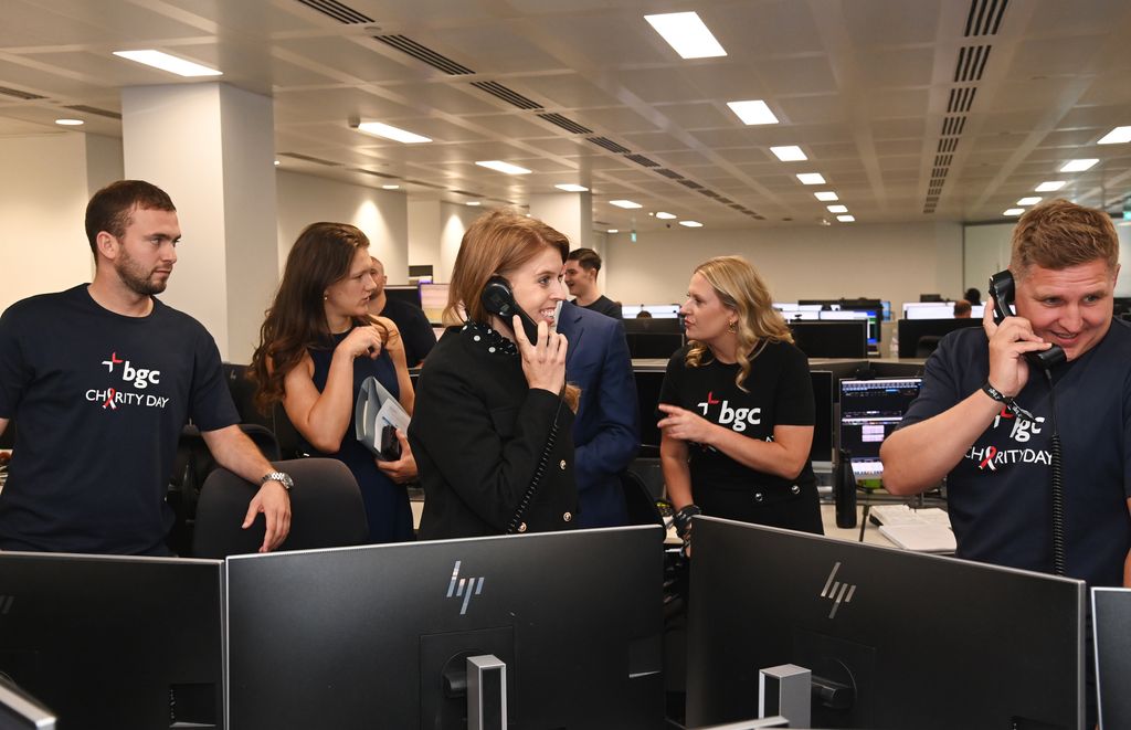 Princess Beatrice answering phone at event