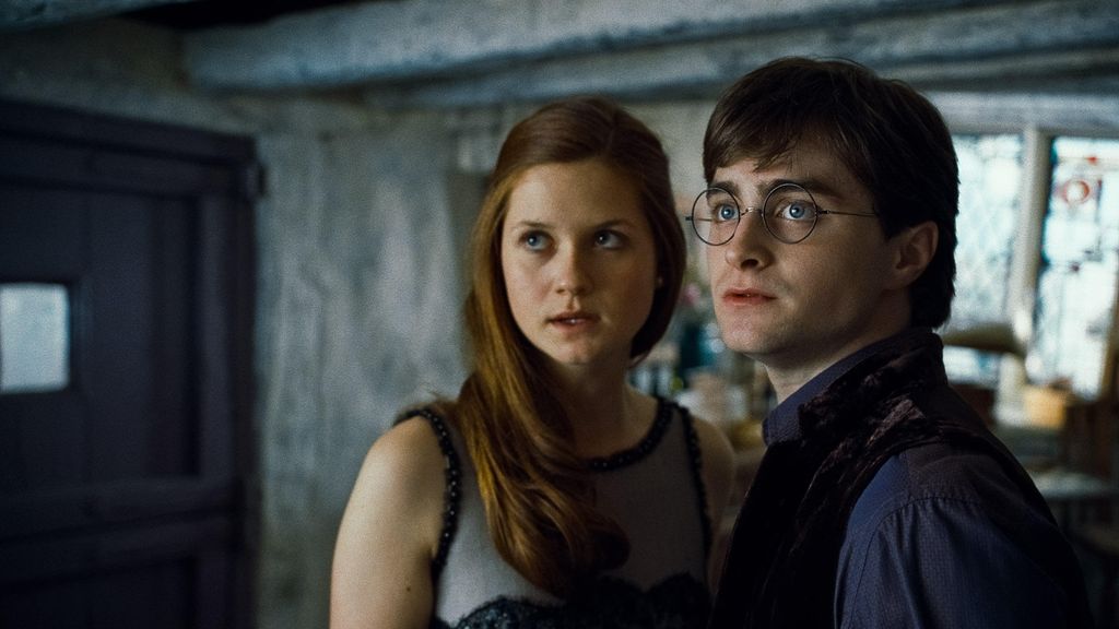 BONNIE WRIGHT as Ginny Weasley and DANIEL RADCLIFFE as Harry Potter in Warner Bros. PicturesO fantasy adventure OHARRY POTTER AND THE DEATHLY HALLOWS D PART 1,O a Warner Bros. Pictures release