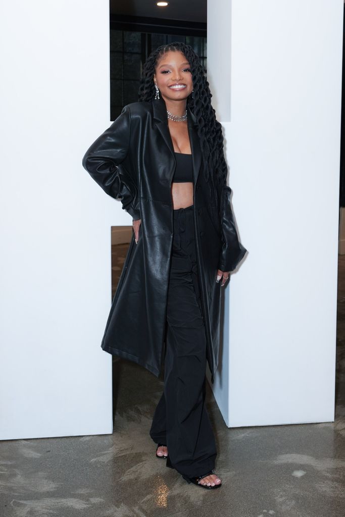 Halle Bailey in leather coat and bra at Chloe x Halle Design Collaboration at Casita Hollywood launch