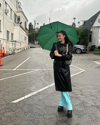 Nicola Peltz Poses With Umbrella