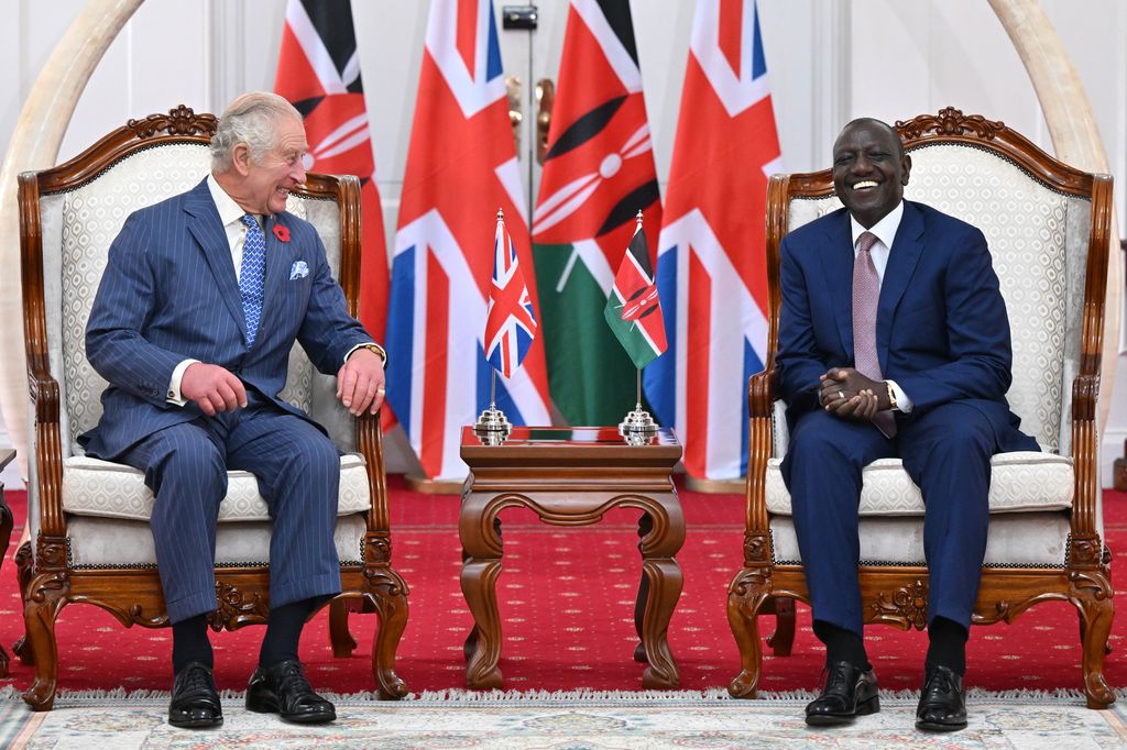 King Charles and The President of the Republic of Kenya William Ruto laugh and smile inside the State House in Nairobi, Kenya