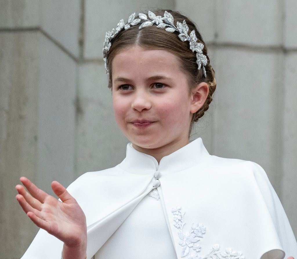 Princess Charlotte waving on balcony at Coronation
