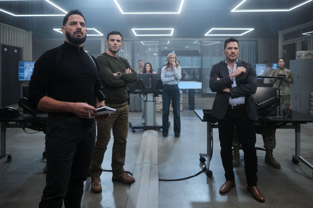 group of investigators standing in office