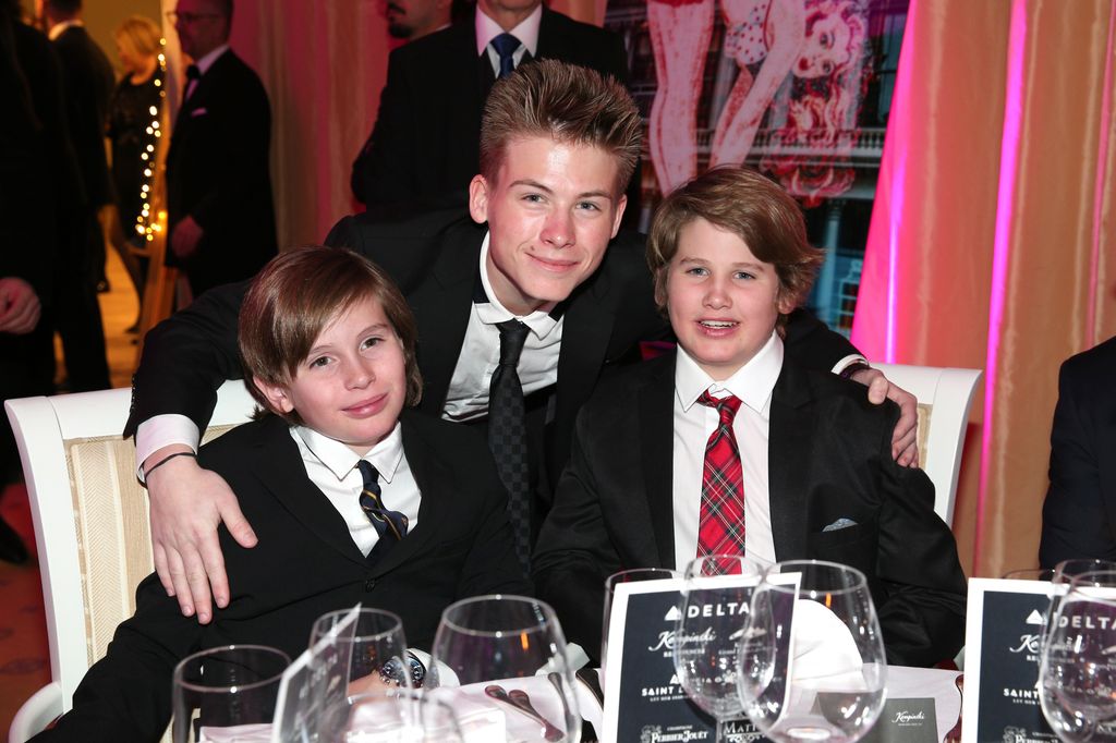 Quinn Kelly Stone, Roan Joseph Bronstein and his brother Laird Vonne Stone, sons of Sharon Stone during the charity gala benefiting 'Planet Hope' foundation at Kempinski Grand Hotel des Bains on December 28, 2017 in St. Moritz, Switzerland.