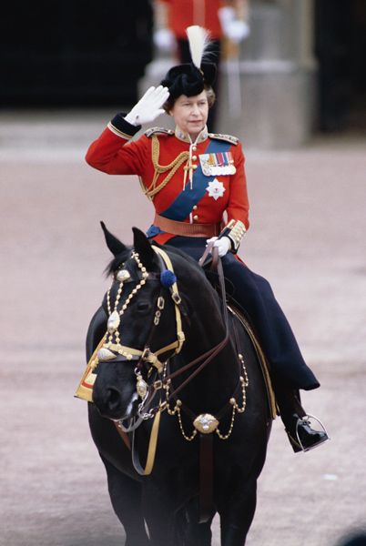 the queen riding a horse 