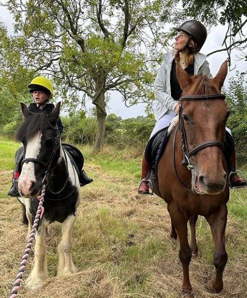 Geri Horner and her son Monty on horseback