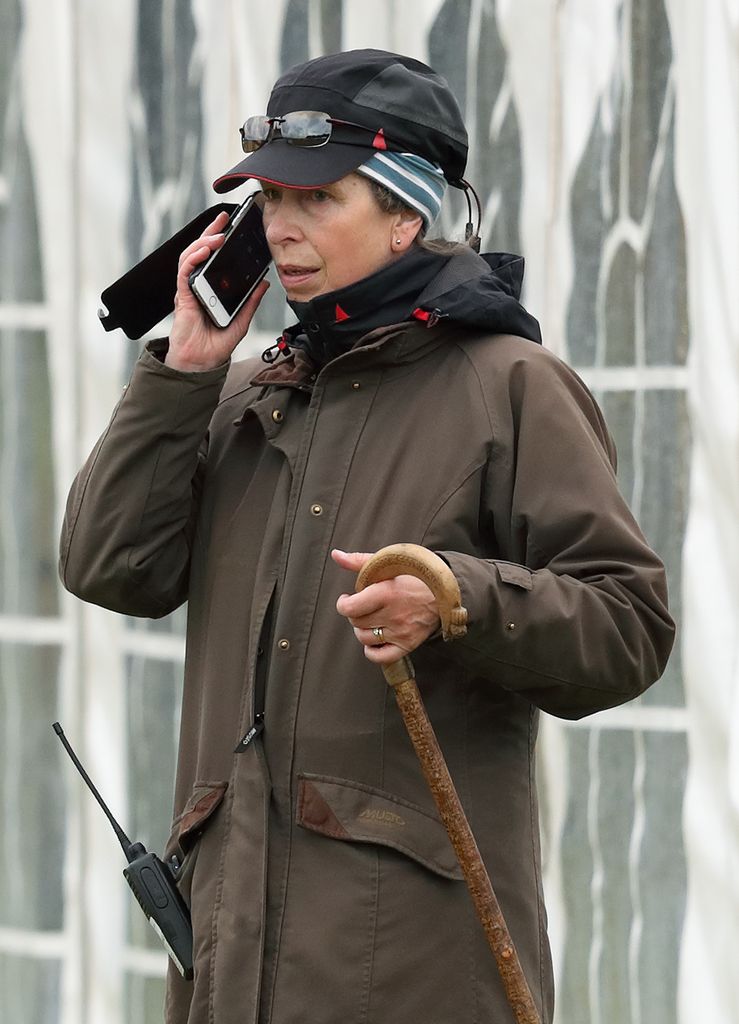 Anne on the phone at horse trials 