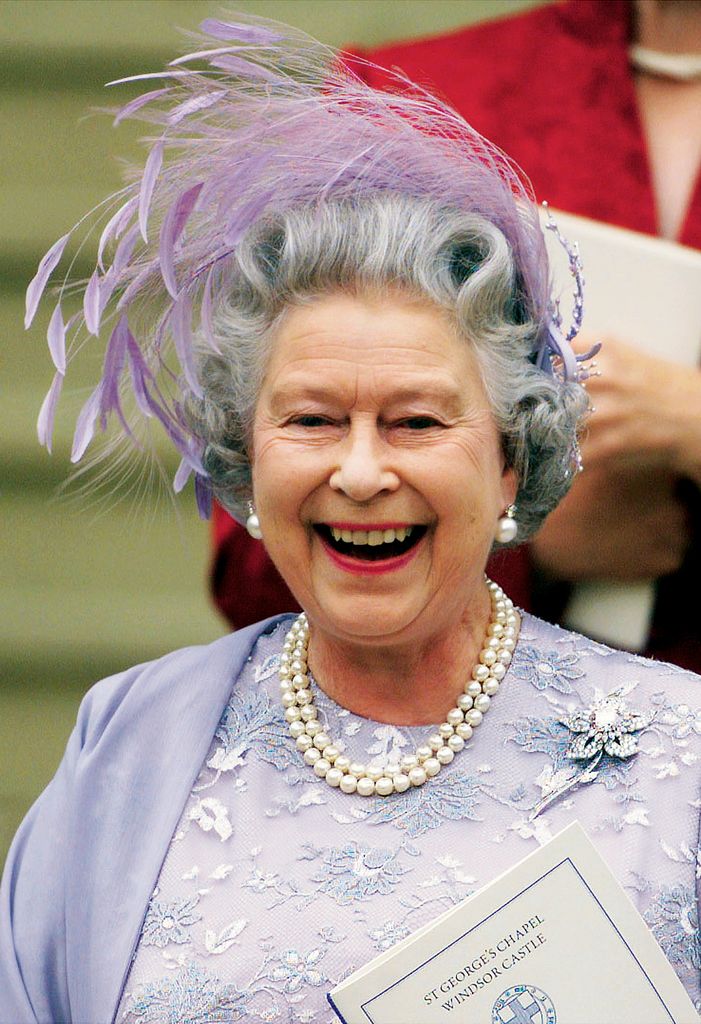 Queen Elizabeth looked radiant in a purple headpiece at er son Prince Edward's wedding