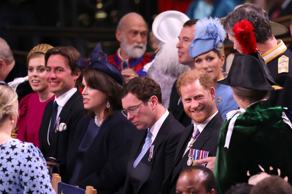 Prince Harry beaming at Princess Anne at the coronation