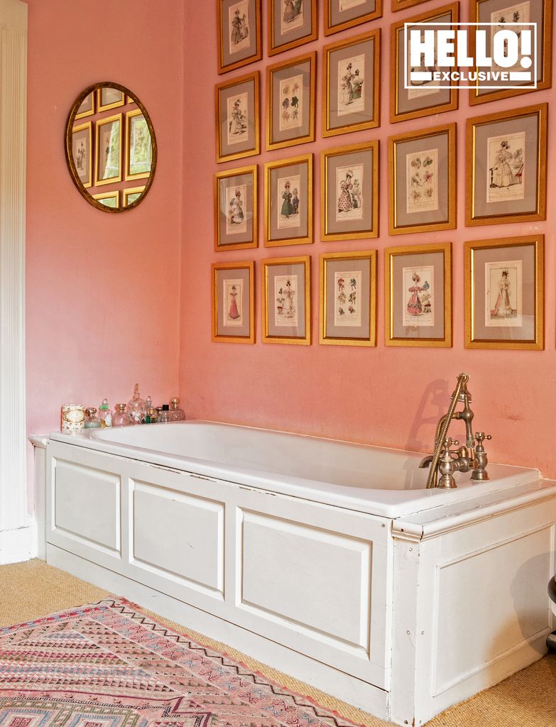 Conran family bathroom with collage of photos over bath