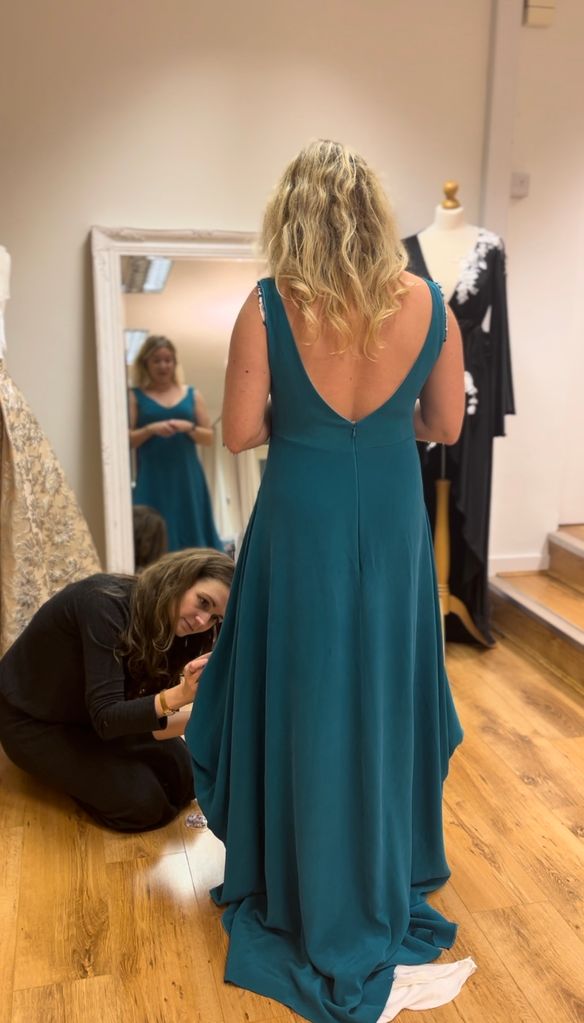 Kate wearing Modify dress with Jennifer during alterations