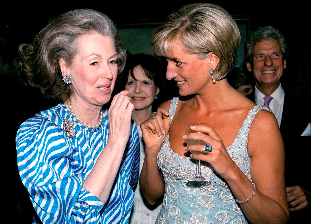Princess Diana talking to her former stepmother Raine Spencer
