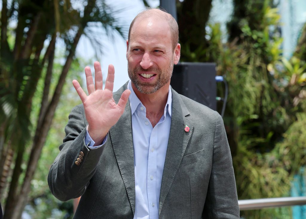 Prince William waves to the public as he visits Sugarloaf Mountain during day one of his visit to Brazil on November 03, 2025