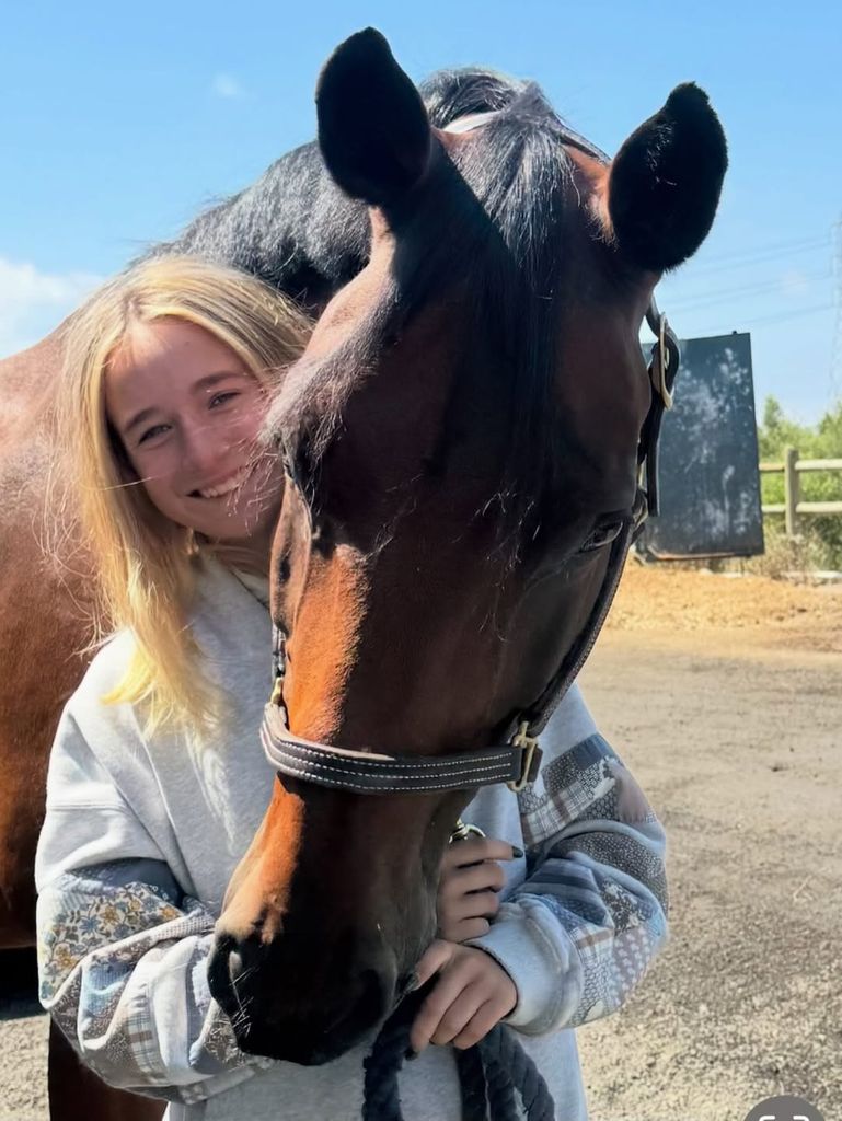grace wahlberg with horse