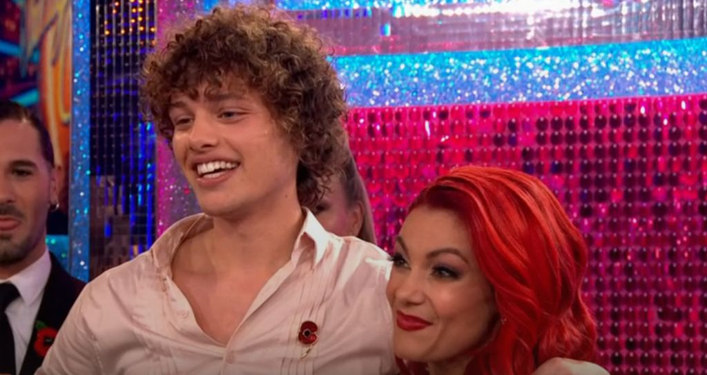 Bobby Brazier standing with Dianne Buswell