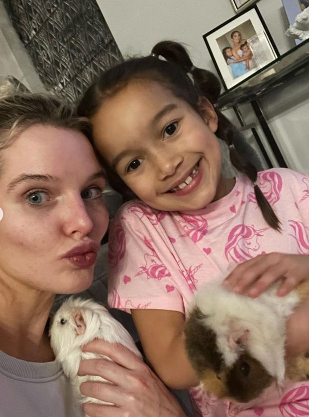 Helen Flanagan and her daughter with two guinea pigs