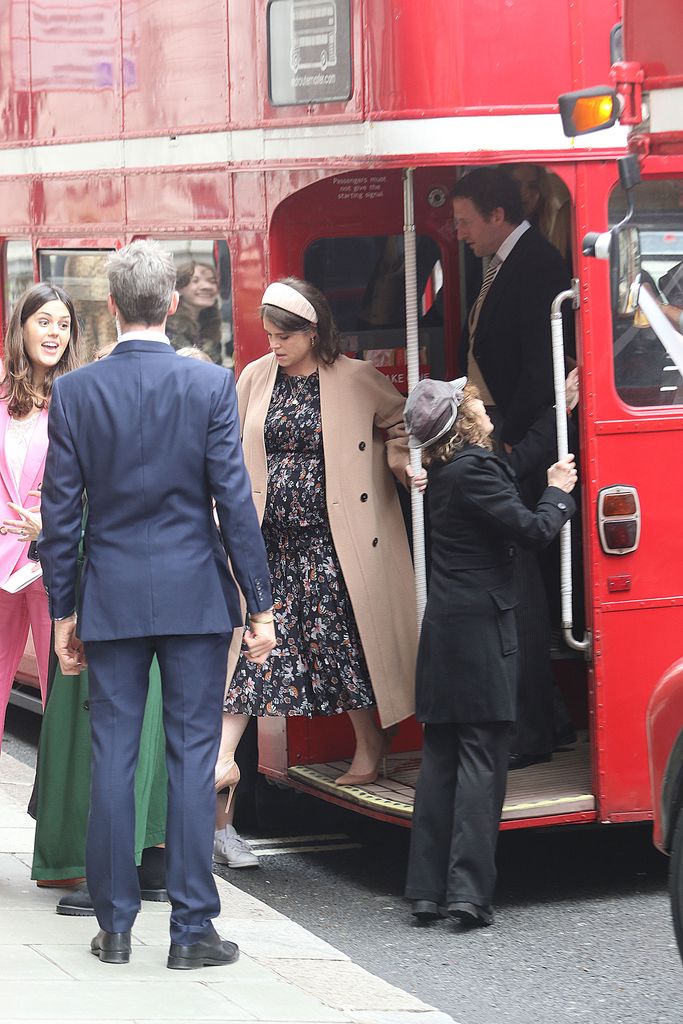 Princess Eugenie getting off a red double-decker bus