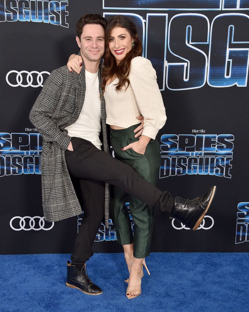 Emma Slater and Sasha Farber arrive at the Premiere Of 20th Century Fox's "Spies In Disguise" at El Capitan Theatre on December 4, 2019 in Los Angeles, California