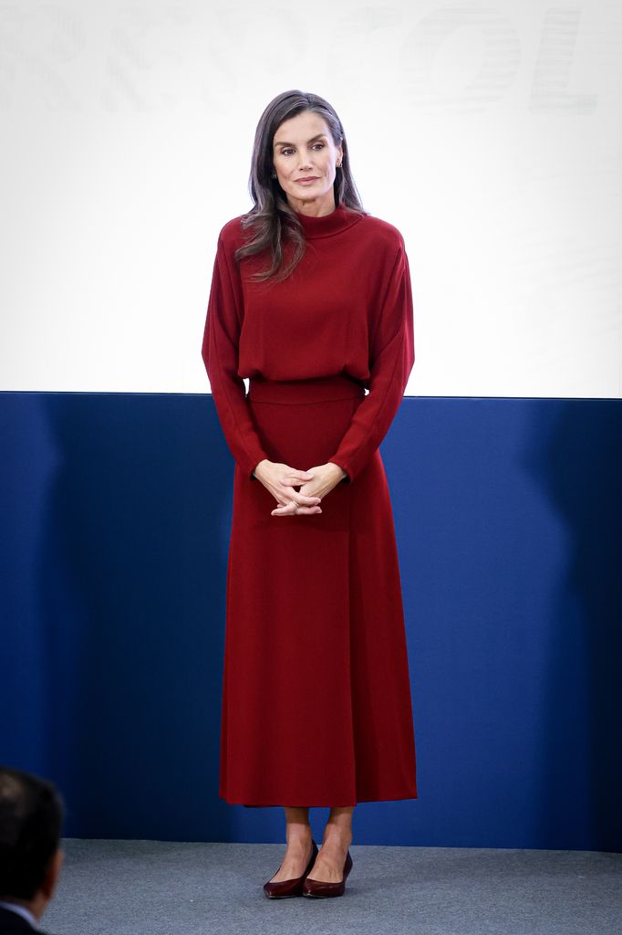 Queen Letizia in dark red jumper and skirt 