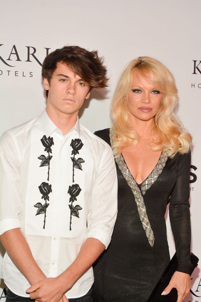 Dylan Jagger standing with Pamela Anderson