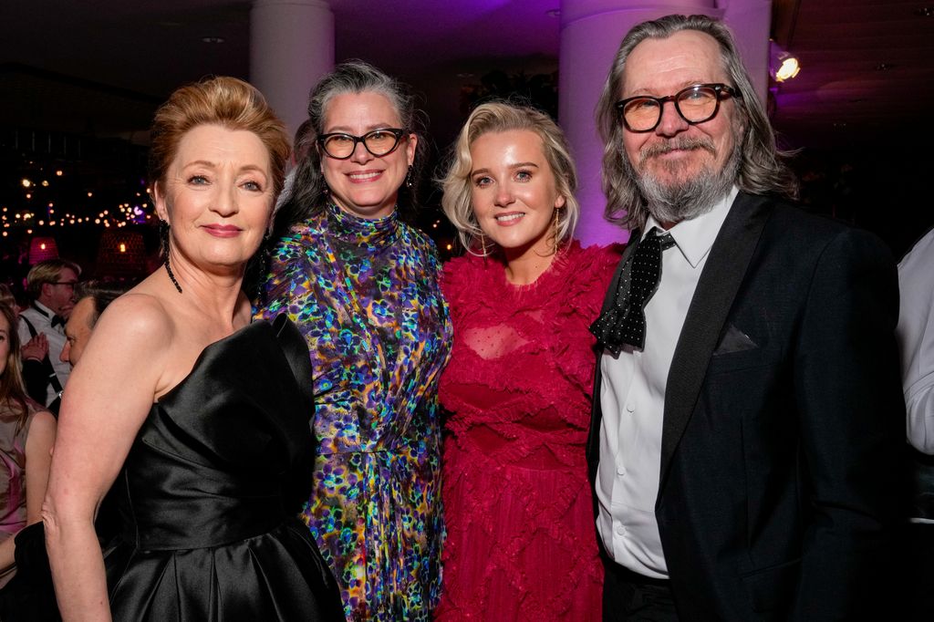 Lesley Manville standing with Gisele Schmidt, Sarah Oldman and Gary Oldman